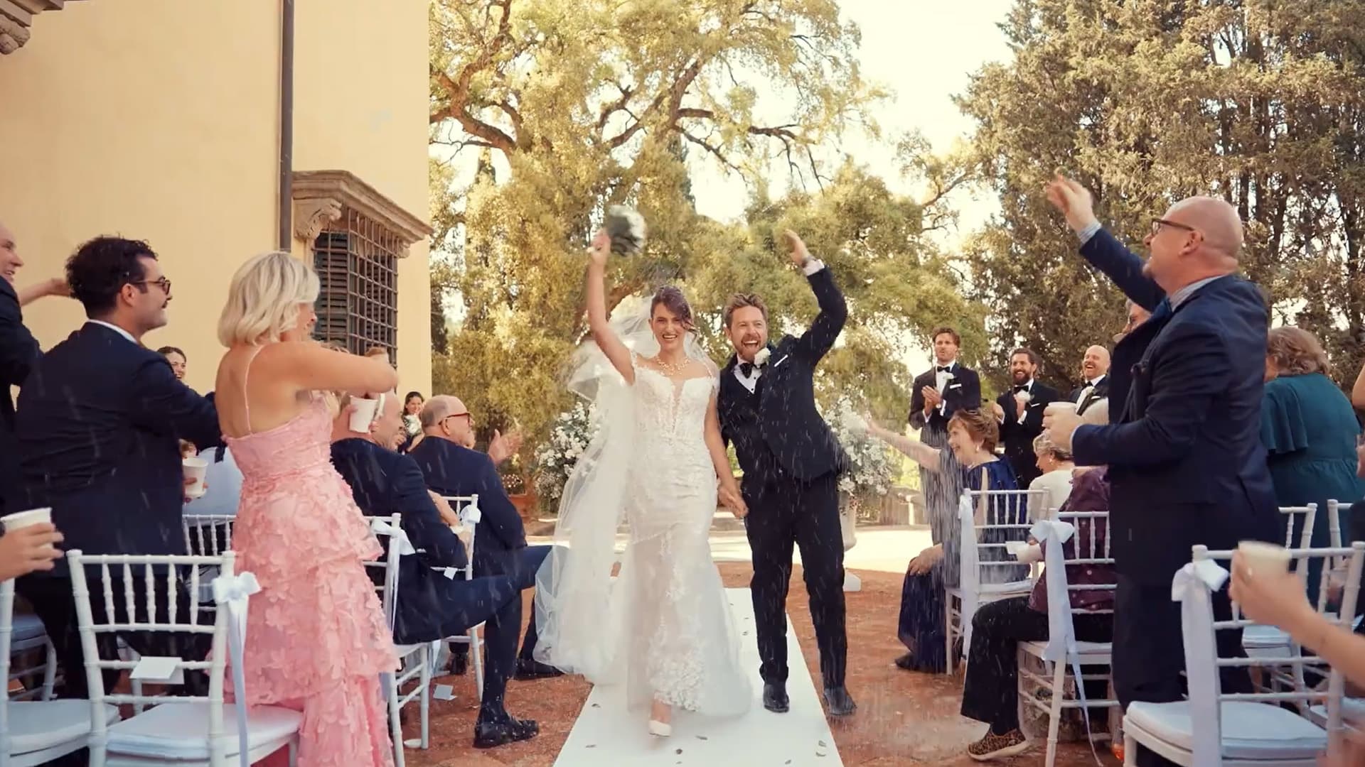 Where cypress trees stand tall and love stories unfold. In the heart of Italy, your love will forever bloom.